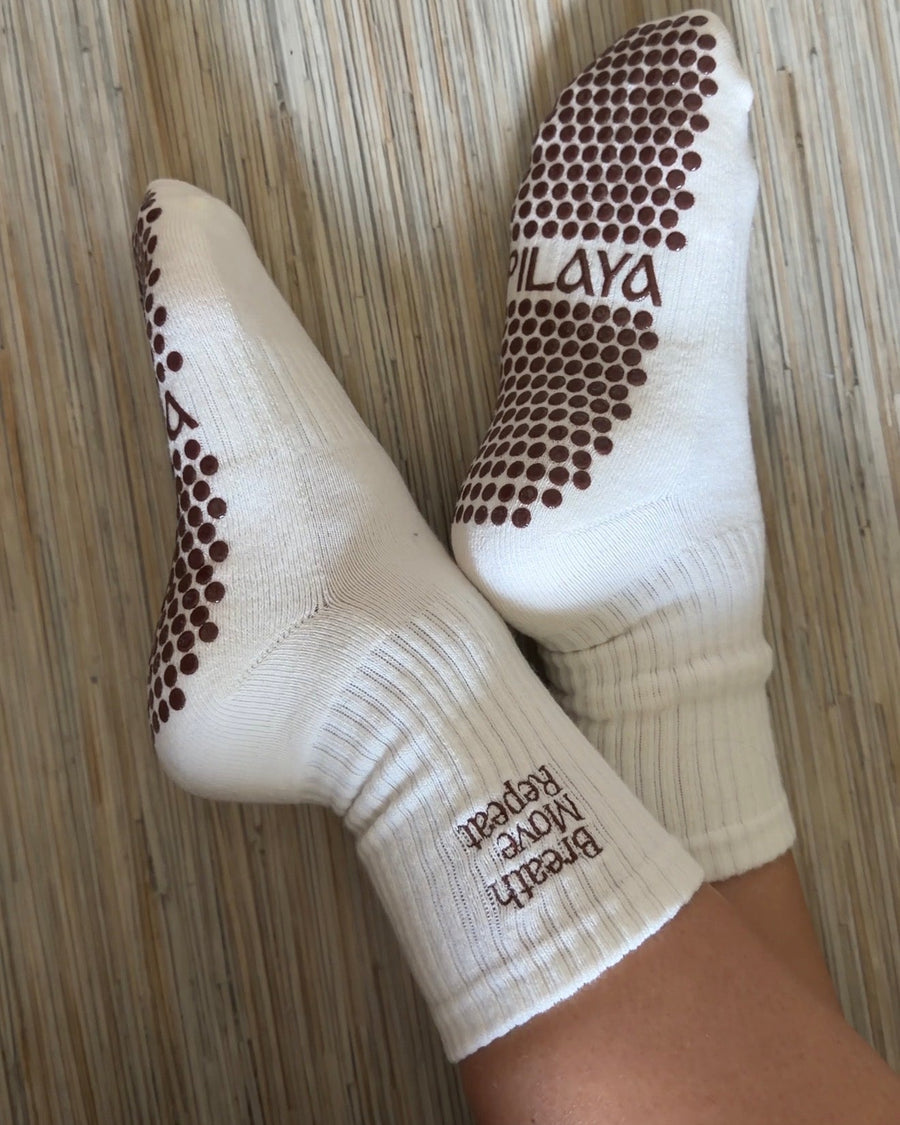 Cliente portant des chaussettes Pilaya
